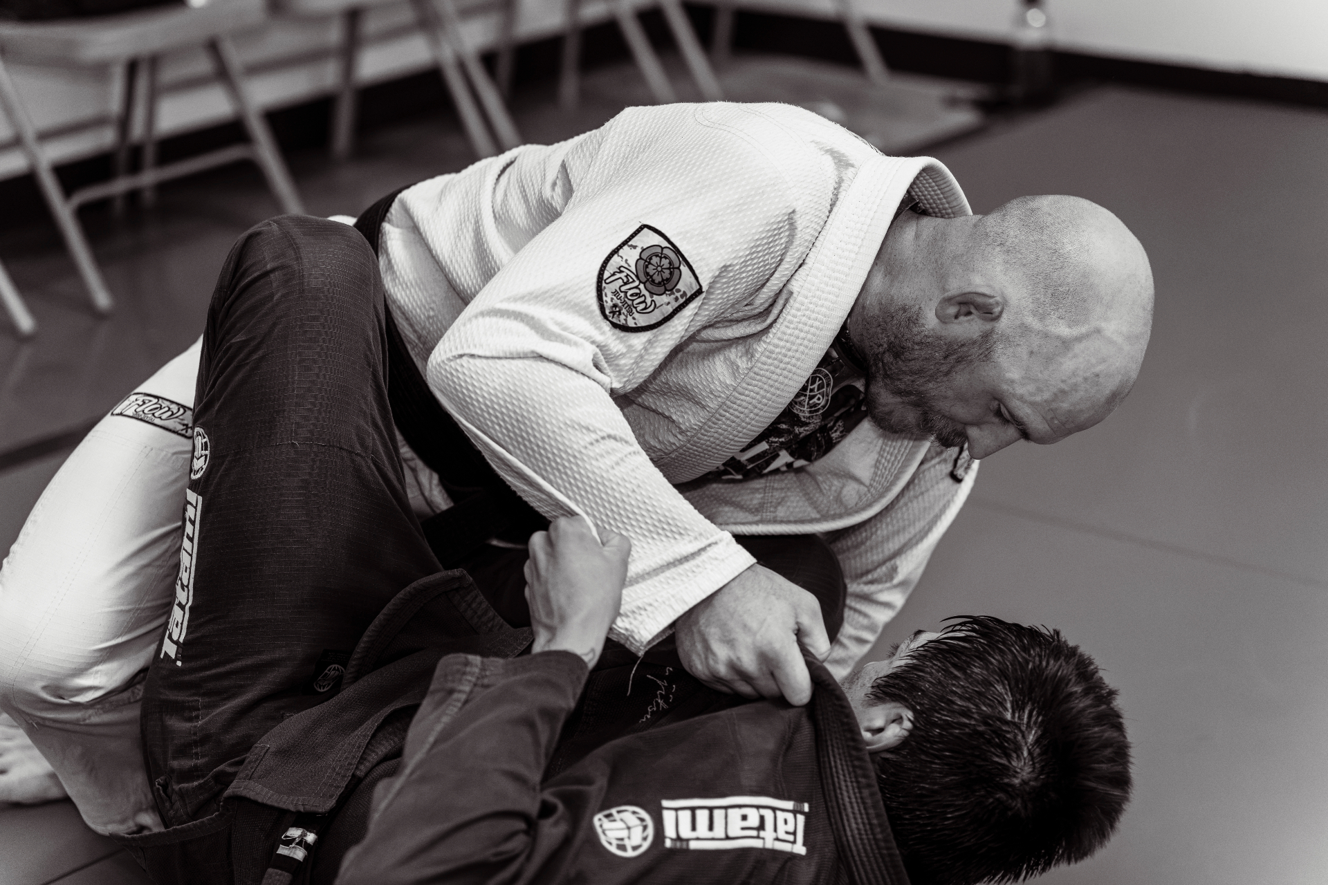 Adult Brazilian Jiu-Jitsu practitioner focused in training